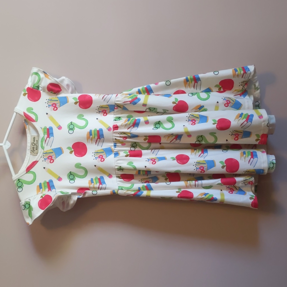 Ava Grace Boutique school supply/ book worm dress